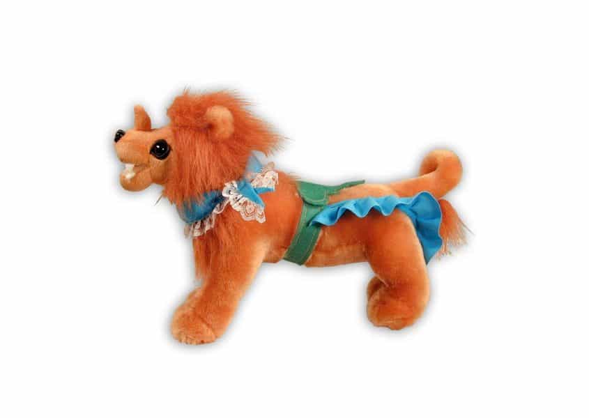 Carousel lion plush with frilly blue harness and green saddle