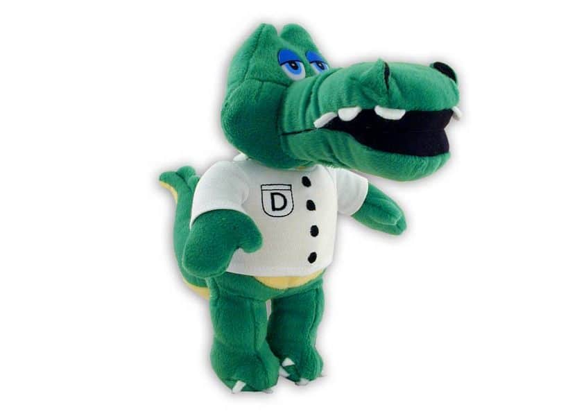 green dentigator alligator plush in dentist shirt
